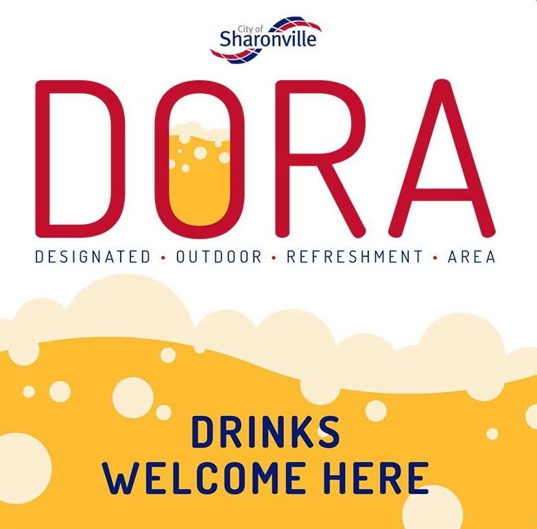 DORA sign - "Drinks Welcome Here"